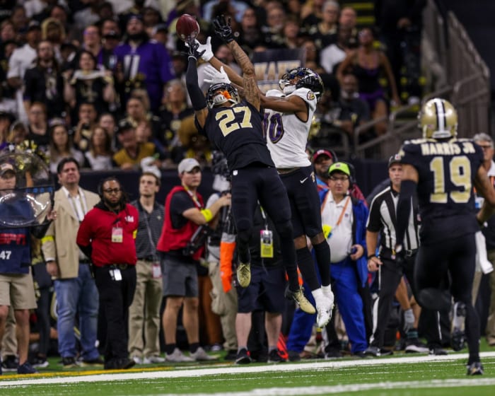 New Orleans Saints cornerback Alontae Taylor (27) breaks up a pass intended for Baltimore Ravens receiver Demarcus Robinson (10). Mandatory Credit: Stephen Lew-USA TODAY Sports